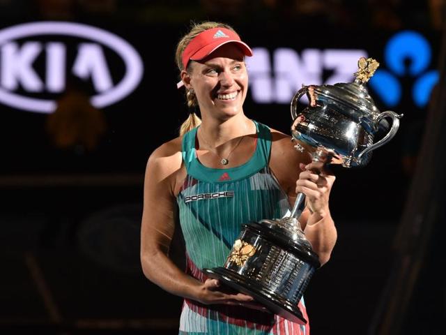 Germany's Angelique Kerber gestures as she holds The Daphne Akhurst Memorial Cup. (AFP) Germany's Angelique Kerber gestures as she holds The Daphne Akhurst Memorial Cup. (AFP)