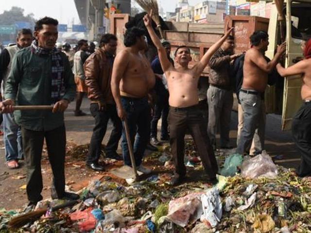 Employees of Delhi’s municipal corporations are on a strike in protest against the non-payment of their salaries since the last three months. Workers’ protest at Laxmi Nagar Chowk on Saturday, January 30, 2016.(Sushil Kumar/HT) Employees of Delhi’s municipal corporations are on a strike in protest against the non-payment of their salaries since the last three months. Workers’ protest at Laxmi Nagar Chowk on Saturday, January 30, 2016.(Sushil Kumar/HT)