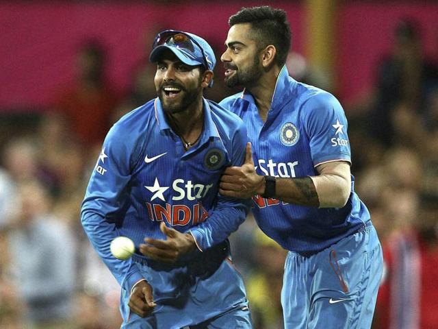 Indian player Virat Kohli, right, and Ravindra Jadeja celebrate taking the wicket of Australia's Chris Lynn. (AP Photo) 