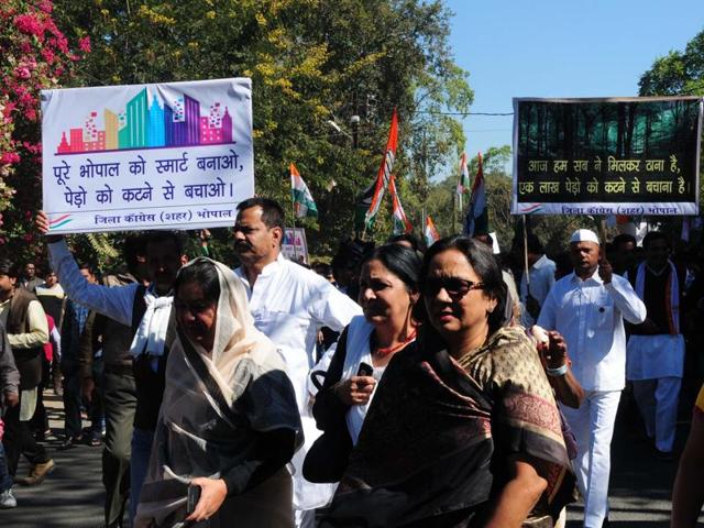 Congress workers protested against the redevelopment of Tulsi Nagar and Shivaji Nagar areas under the Smart City plan to save thousands of trees in the area on December 28, 2015. (HT file photo) Congress workers protested against the redevelopment of Tulsi Nagar and Shivaji Nagar areas under the Smart City plan to save thousands of trees in the area on December 28, 2015. (HT file photo)