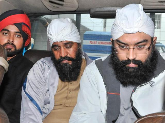 Accused Harbhej Singh and Ranjit Singh (right) in police custody in Jalandhar on Saturday. (Pardeep Pandit/HT Photo) Accused Harbhej Singh and Ranjit Singh (right) in police custody in Jalandhar on Saturday. (Pardeep Pandit/HT Photo)
