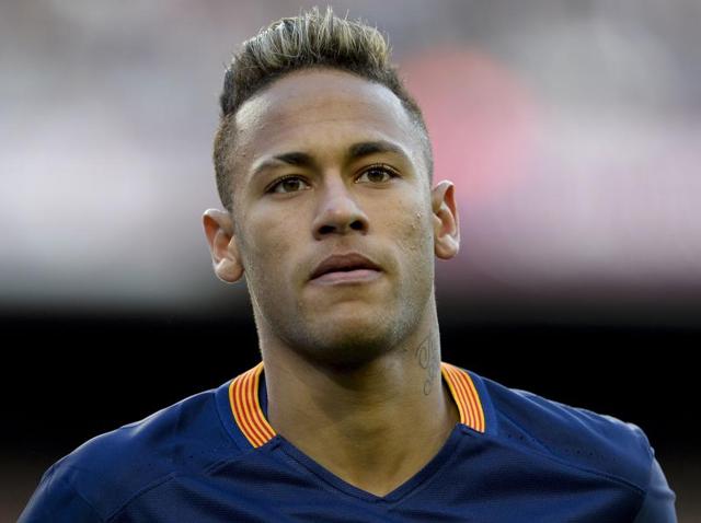 Public prosecutors filed for action to be taken after a complaint of fraud and corruption was launched by the Brazilian investment fund DIS, which held 40 percent of Neymar’s sporting rights when he played at Santos.(AFP Photo)