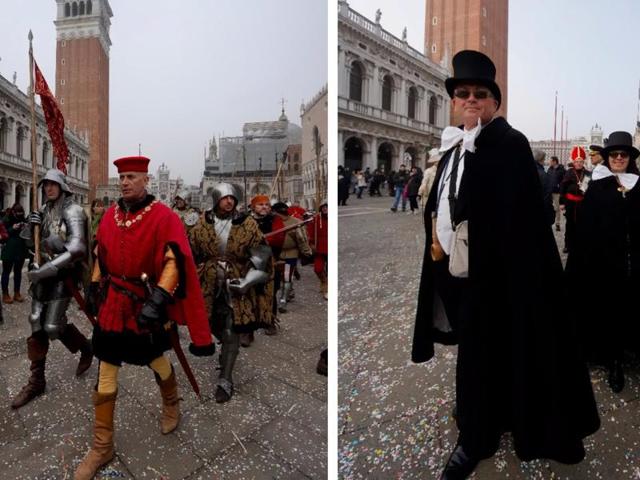 Carnival masqueraders walk in St. Mark’s Square in Venice on Sunday. Carnival-goers in Venice are being asked by police to momentarily lift their masks as part of new anti-terrorism measures for the annual festivities. (AP) 