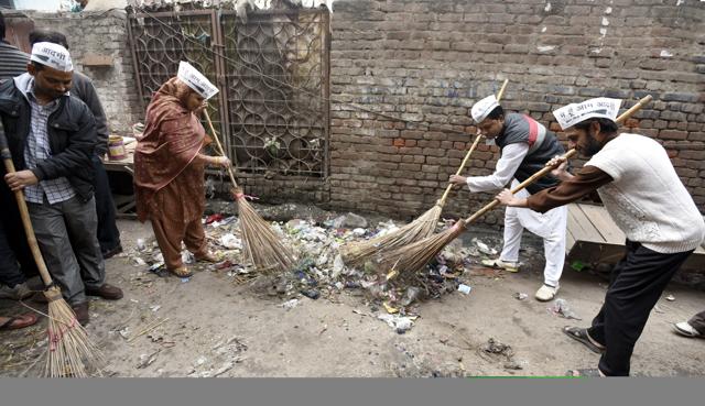 AAP Worker cleaning a Road Prem Gali Gandhi Nagar area during MCD Worker Strike protest over non-payment of salaries for the last three months, in East Delhi, India on Sunday, January 31, 2016. (Hindustan Times) AAP Worker cleaning a Road Prem Gali Gandhi Nagar area during MCD Worker Strike protest over non-payment of salaries for the last three months, in East Delhi, India on Sunday, January 31, 2016. (Hindustan Times)