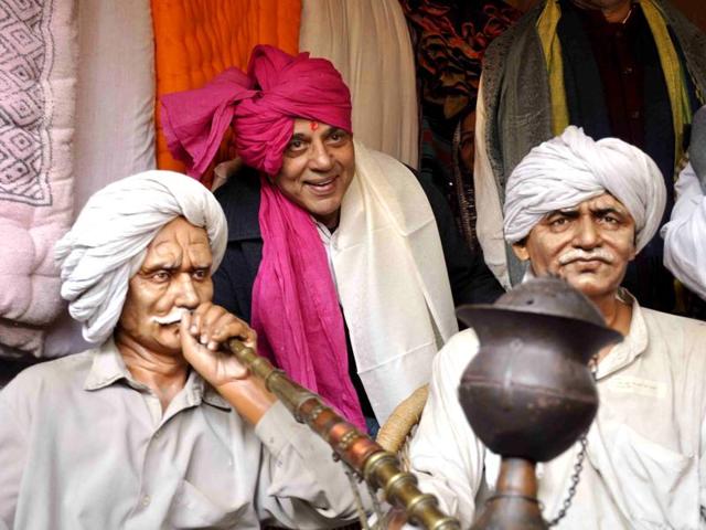 Actor Dharmendra during the inauguration of Surajkund Mela near Faridabad on Monday. (Subhash Sharma/HT)