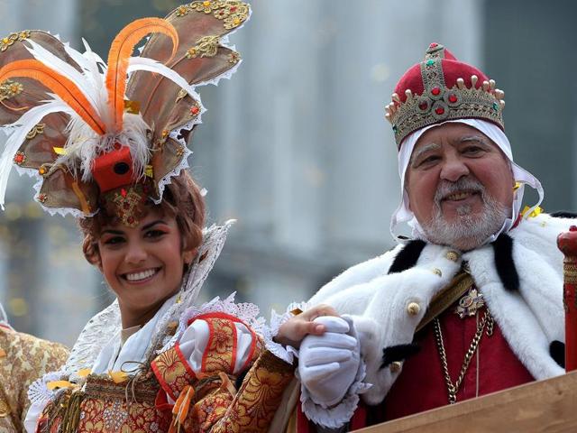Performer Irene Rizzi poses with an actor dressed as a Doge (lord) after performing the Angel Flight or Flight of the Dove from the bell tower of Saint Mark’s square.  (AFP) 