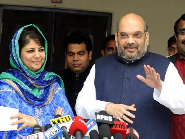BJP president Amit Shah with PDP president Mehbooba Mufti in New Delhi. The Jammu Kashmir governor has given the parties a day to decide on their alliance to form the state government. (HT File Photo) BJP president Amit Shah with PDP president Mehbooba Mufti in New Delhi. The Jammu Kashmir governor has given the parties a day to decide on their alliance to form the state government. (HT File Photo)