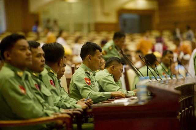 Myanmar's military members of Parliament attend the new lower house parliamentary session in Naypyidaw. (AFP) Myanmar's military members of Parliament attend the new lower house parliamentary session in Naypyidaw. (AFP)