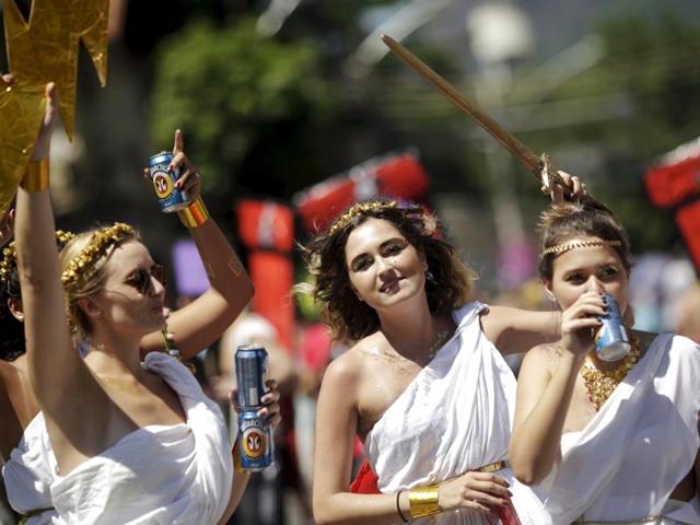 Revellers dance during the annual block party known as the ‘Suvaco do Cristo’ (Armpit of Christ), one of the many pre-carnival parties to take place in the neighbourhoods of Rio de Janeiro. (REUTERS) 