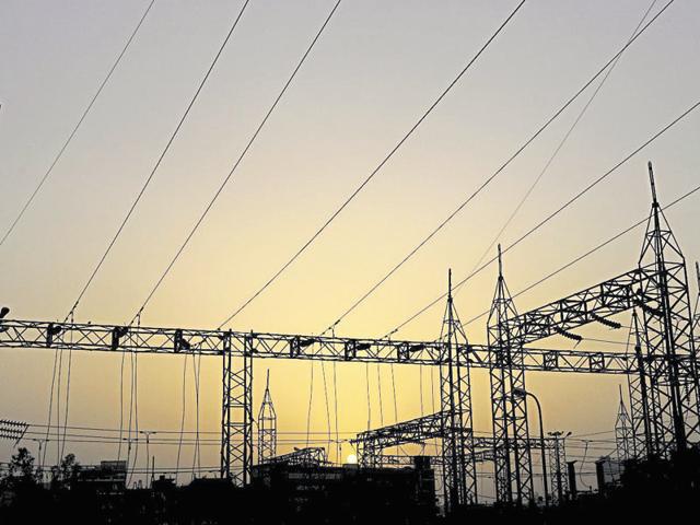 India Ratings and Research expects power demand to grow modestly at 4-5% and power generation at 5-6% in FY 2016-17, with deficits remaining low at 3-4%. (HT File Photo)