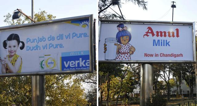 The billboard war is on between the two giants in SAS Nagar with Verka promising “purity”, while Amul offering the “Taste of India” at competitive rates. (Gurminder Singh /HT) The billboard war is on between the two giants in SAS Nagar with Verka promising “purity”, while Amul offering the “Taste of India” at competitive rates. (Gurminder Singh /HT)