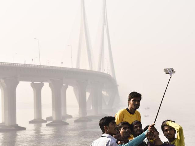 A group of bouys take selfie at Bandra on Sunday. (Kunal Patil/HT)