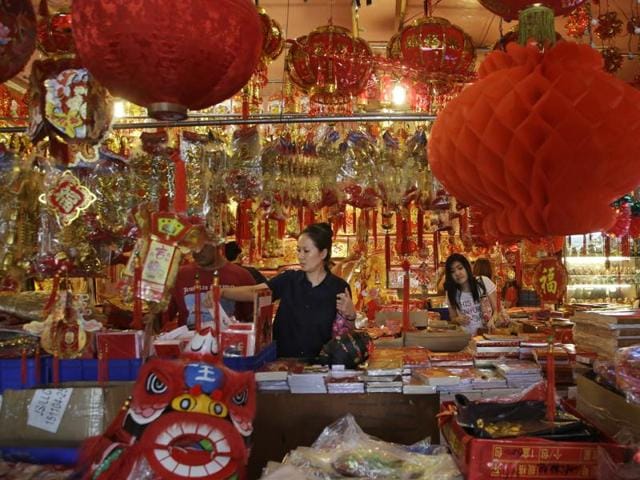 Indonesians of Chinese descent browse for decorations in Jakarta, Indonesia, on February 2, 2016. (AP) 