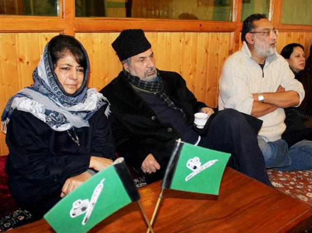 Peoples Democratic Party (PDP) president Mehbooba Mufti with during a party meeting at Mufti residence in Srinagar.(PTI)