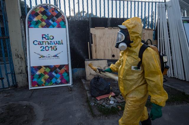 A municipal agent sprays anti Zika mosquitos chimical product at the sambadrome in Rio de Janeiro. (AFP) A municipal agent sprays anti Zika mosquitos chimical product at the sambadrome in Rio de Janeiro. (AFP)