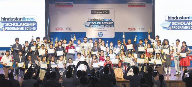 Actor Ayushmann Khurrana (last row, centre) with the 50 winners of the HT Scholarship Programme, at Shanmukhananda Auditorium in Sion on Tuesday. (Satish Bate/HT)