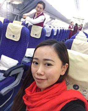 This photo taken on February 1, 2016 shows a Chinese woman surnamed Zhang (lower R) taking photos with her mobile phone on an empty flight from Wuhan to Guangzhou, after the China Southern flight was delayed for 10 hours. (AFP) This photo taken on February 1, 2016 shows a Chinese woman surnamed Zhang (lower R) taking photos with her mobile phone on an empty flight from Wuhan to Guangzhou, after the China Southern flight was delayed for 10 hours. (AFP)