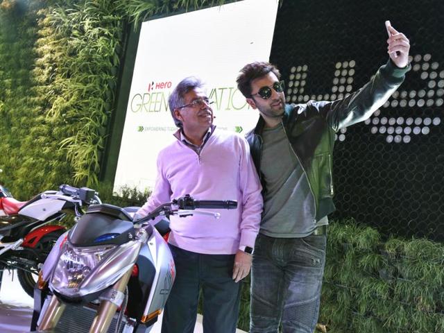 Ranbir Kapoor with chairman of Hero Motors Pawan Munjal during the launch of new Honda Extreme Bike. (Mohd Zakir/HT)