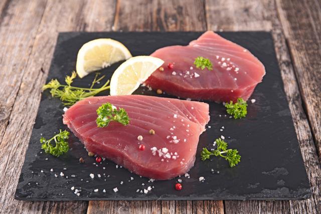 Previous research has found that eating a portion of oily fish such as tuna, salmon, or sardines one-two times a week can reduce the risk of breast cancer. (Shutterstock) Previous research has found that eating a portion of oily fish such as tuna, salmon, or sardines one-two times a week can reduce the risk of breast cancer. (Shutterstock)