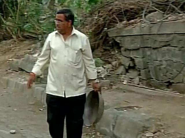 Dadarao Bilhore, who lost his son in a road accident last year, has found a unique way of paying homage to his son by filling small open potholes.