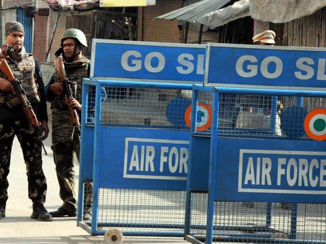File photo of soldiers keeping guard at the perimeter fence of the Indian Air Force base in Pathankot. (AP) File photo of soldiers keeping guard at the perimeter fence of the Indian Air Force base in Pathankot. (AP)
