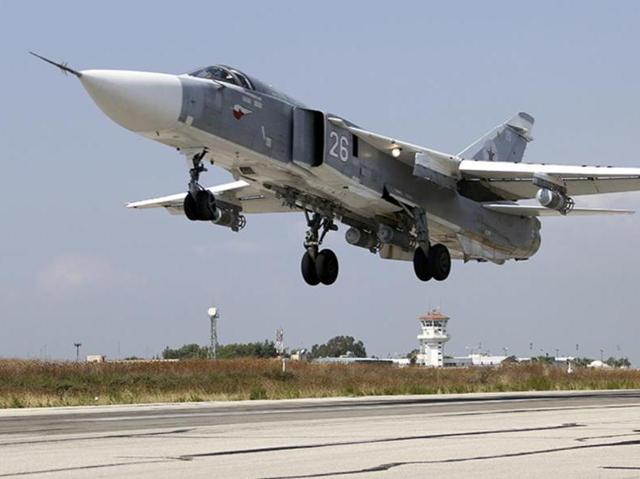 A Russian SU-24M jet fighter armed with laser guided bombs takes off from a runaway at Hmeimim airbase in Syria. Turkey’s foreign ministry has confirmed that it had refused to allow a Russian plane to fly near its border with Syria. (AP Photo) A Russian SU-24M jet fighter armed with laser guided bombs takes off from a runaway at Hmeimim airbase in Syria. Turkey’s foreign ministry has confirmed that it had refused to allow a Russian plane to fly near its border with Syria. (AP Photo)