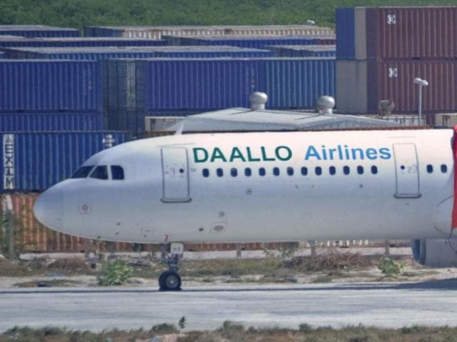 A picture taken on February 3, 2016 shows a plane operated by Daallo Airlines, after it made an emergency landing in Mogadishu following a blast. (AFP) A picture taken on February 3, 2016 shows a plane operated by Daallo Airlines, after it made an emergency landing in Mogadishu following a blast. (AFP)