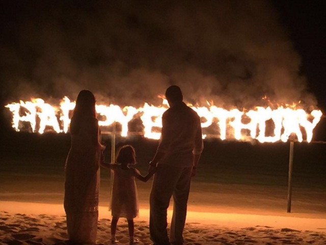 A rather fiery birthday for Abhishek: The actor shared this picture with Aaradhya and Aishwarya.  (Instagram) 
