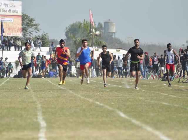 RURAL RUN: A sprint in progress during the Kila Raipur games, also known as the Rural Olympics, Near Ludhiana on Friday. (Sikander Singh Chopra/HT Photo)