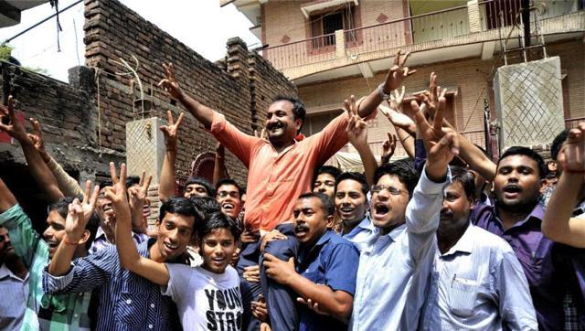 Founder of ‘Super 30’, Anand Kumar, celebrates along with his students who cracked the Indian Institute of Technology-Joint Entrance Examination (IIT-JEE) 2012, in Patna. (PTI) Founder of ‘Super 30’, Anand Kumar, celebrates along with his students who cracked the Indian Institute of Technology-Joint Entrance Examination (IIT-JEE) 2012, in Patna. (PTI)