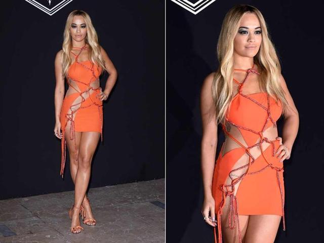 Rita Ora at the Atelier Versace show: It’s tiny. It’s bright orange. It has a tangle of tenuously knotted ropes holding it all together. Few women posess the minerals to step out in something like this. But then of course this is not Rita’s first rodeo. (Instagram/ Pinterest) Rita Ora at the Atelier Versace show: It’s tiny. It’s bright orange. It has a tangle of tenuously knotted ropes holding it all together. Few women posess the minerals to step out in something like this. But then of course this is not Rita’s first rodeo. (Instagram/ Pinterest)