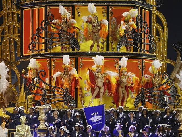 Dancers from the Nene de Vila Matilde samba school perform on a float during a carnival parade in Sao Paulo, Brazil. (AP) 