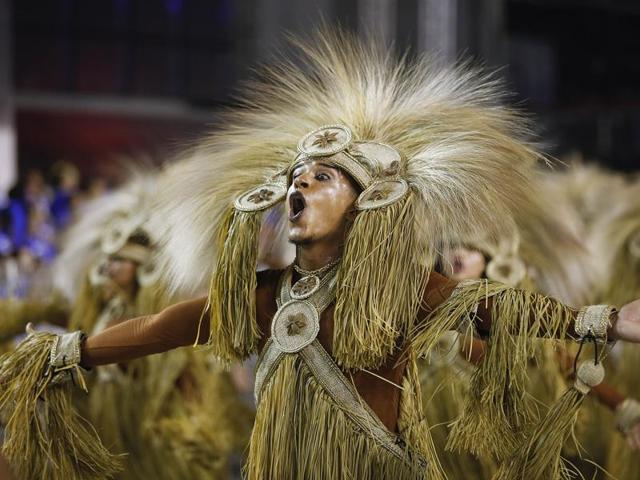 A dancer from the Perola Negra samba school performs during a carnival parade in Sao Paulo, Brazil. (AP) 