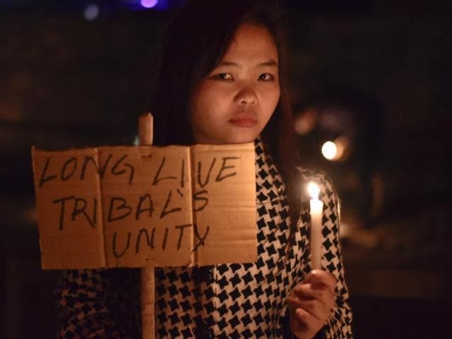 Residents of Manipur’s Churachandpur town keep a vigil outside the district morgue, where bodies of nine people who died during street protests last year. The protests were against three bills that tribals claim will infringe on their rights and refuse to bury the bodies(Ravi Choudhary / Hindustan Times) Residents of Manipur’s Churachandpur town keep a vigil outside the district morgue, where bodies of nine people who died during street protests last year. The protests were against three bills that tribals claim will infringe on their rights and refuse to bury the bodies(Ravi Choudhary / Hindustan Times)