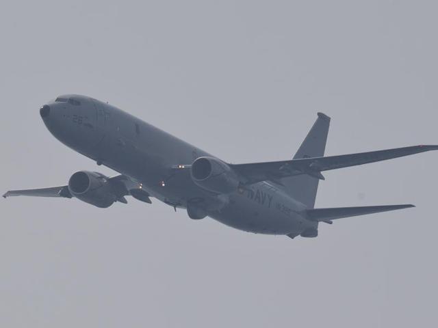 A Boeing P-8I, the Indian Navy’s multi-mission maritime patrol aircraft flies past during the International Fleet Review in Vishakapatnam. (AP Photo)