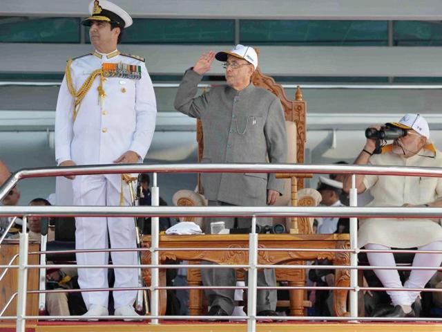 President Pranab Mukherjee, Prime Minister Narendra Modi and chief of naval staff RK Dhowan at the International Fleet Review and Flypast in Visakhapatnam. (PTI Photo)