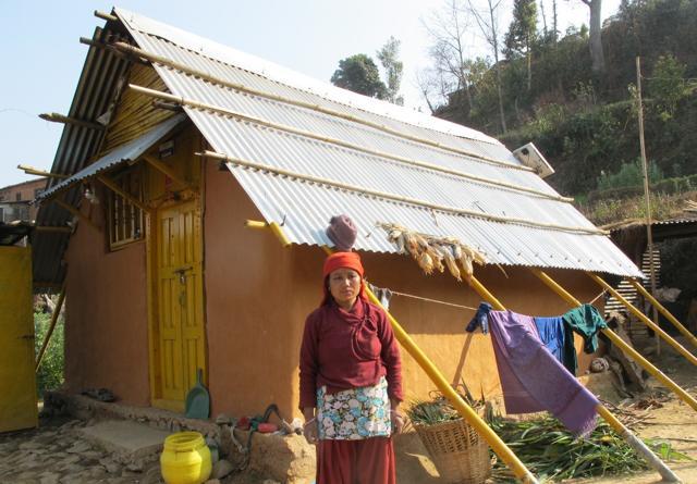 Kamala Goley outside her transitional shelter constructed with help from Chaudhary Foundation at Bhurungchuli near Kathmandu. (Utpal Parashar/HT Photo)