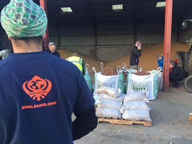 As they do during most floods, Khalsa Aid volunteers turned up in the tiny, submerged villages in Britain.