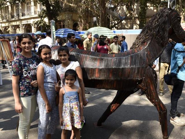 Children enjoy at the street art exhibition at the Kala Ghoda Festival. (Kunal Patil/ HT Photos)