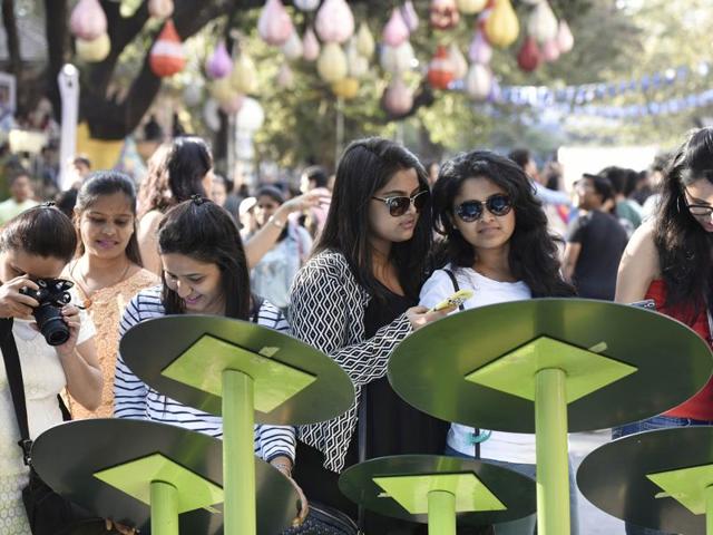 Revellers at an art installation at Kala Ghoda Art Festival on Saturday. (Anshuman Poyrekar/ HT photos)