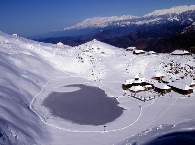 The famous Parashar Lake and temple after the snow in Mandi on Sunday. (birbal sharma/ht)