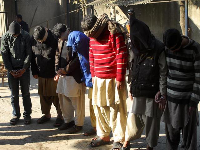 Pakistani suspects allegedly affiliated with the Islamic State graup, wait to appear in the anti-terrorist court, in Gujranwala, Pakistan. (AP Photo) Pakistani suspects allegedly affiliated with the Islamic State graup, wait to appear in the anti-terrorist court, in Gujranwala, Pakistan. (AP Photo)