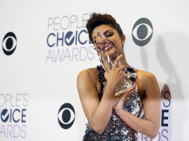Priyanka Chopra poses backstage with her award for Favourite Actress in a New TV Series during the People's Choice Awards 2016 in Los Angeles. (REUTERS)