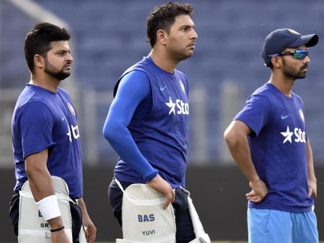 From left to right: Suresh Raina, Yuvraj Singh and Ajinkya Rahane during a practice session on the eve of the first T20 between India and Sri Lanka at Maharashtra Cricket Association Stadium in Pune on February 8, 2016.(Kunal Patil/HT Photo)