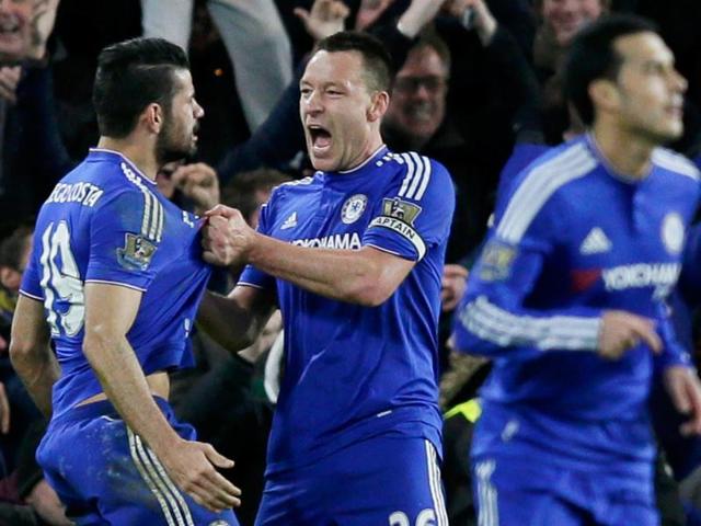 Chelsea's Diego Costa celebrates scoring their first goal against Manchester United. (Reuters Photo) Chelsea's Diego Costa celebrates scoring their first goal against Manchester United. (Reuters Photo)