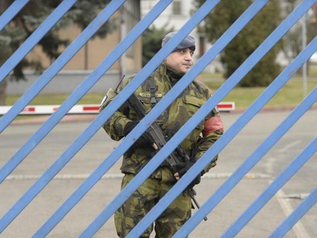 A soldier patrols at the military airport in Prague. The Czech government paid a $6-million ransom to secure the release of two women kidnapped by armed men in Pakistan.(AP) A soldier patrols at the military airport in Prague. The Czech government paid a $6-million ransom to secure the release of two women kidnapped by armed men in Pakistan.(AP)