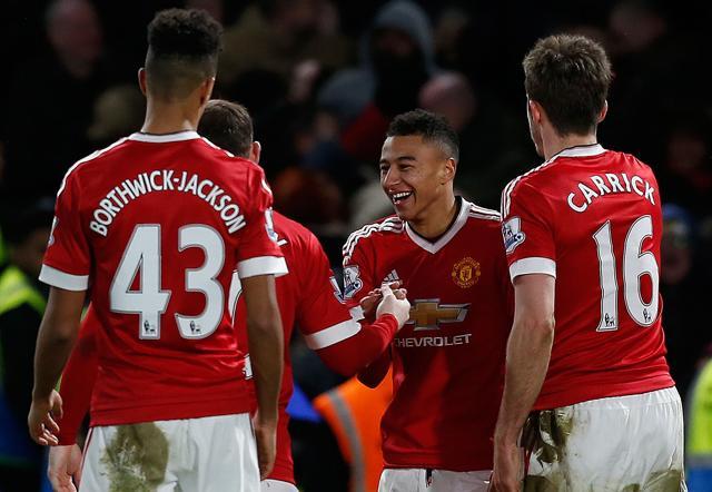 Manchester United's midfielder Jesse Lingard celebrates with teammates after scoring during the English Premier League football match between Chelsea and Manchester United. (AFP Photo) Manchester United's midfielder Jesse Lingard celebrates with teammates after scoring during the English Premier League football match between Chelsea and Manchester United. (AFP Photo)