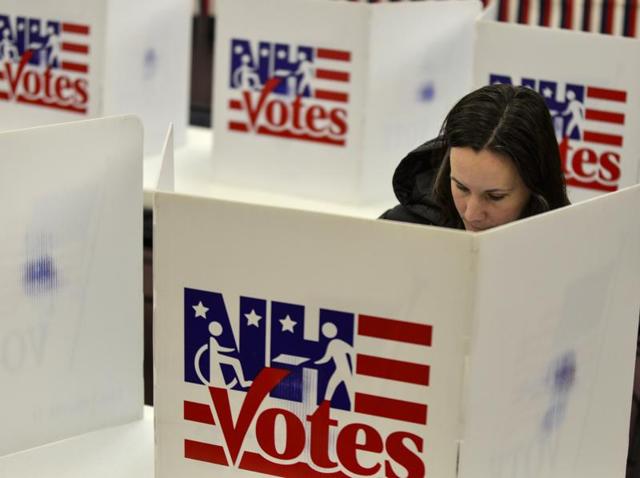 A voter casts her ballot at the Swanzey, NH polling station during the New Hampshire primary. (AP Photo) A voter casts her ballot at the Swanzey, NH polling station during the New Hampshire primary. (AP Photo)