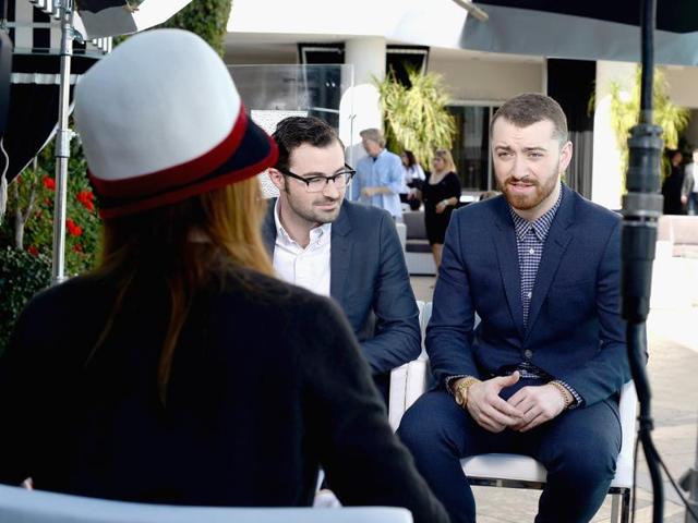 Singers/songwriters Jimmy Napes (L) and Sam Smith being interviewed. They are nominated in the Best Original Song category for Spectre’s theme ‘Writing’s on the Wall’. (AFP)