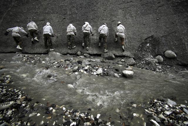 Indian army soldiers prepare to climb a glacier as they undergo a training session at the Siachen base camp. (AP) Indian army soldiers prepare to climb a glacier as they undergo a training session at the Siachen base camp. (AP)